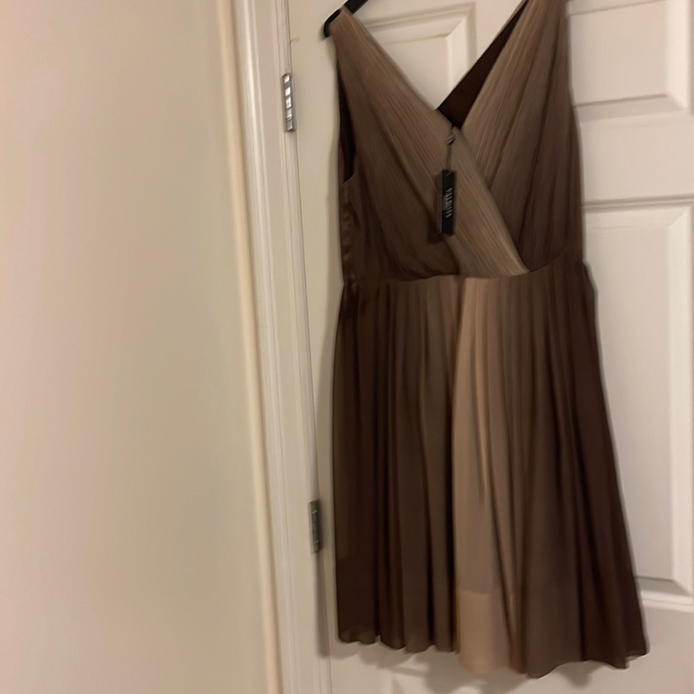 Beautiful brown and creamish Crêpe material never been worn